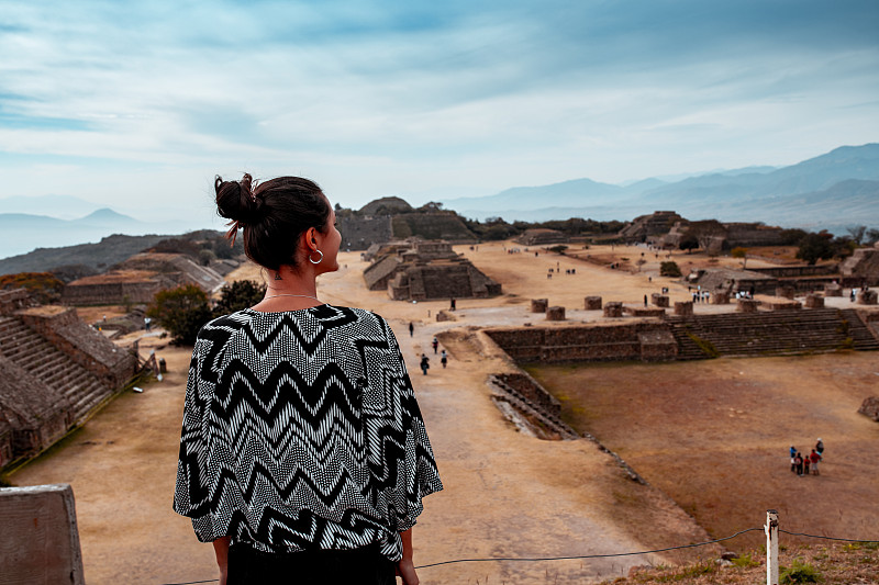 Young,woman,enjoying,the,view,on,Monte,Albán,Archaeological,site,,Oaxaca,,Mexico