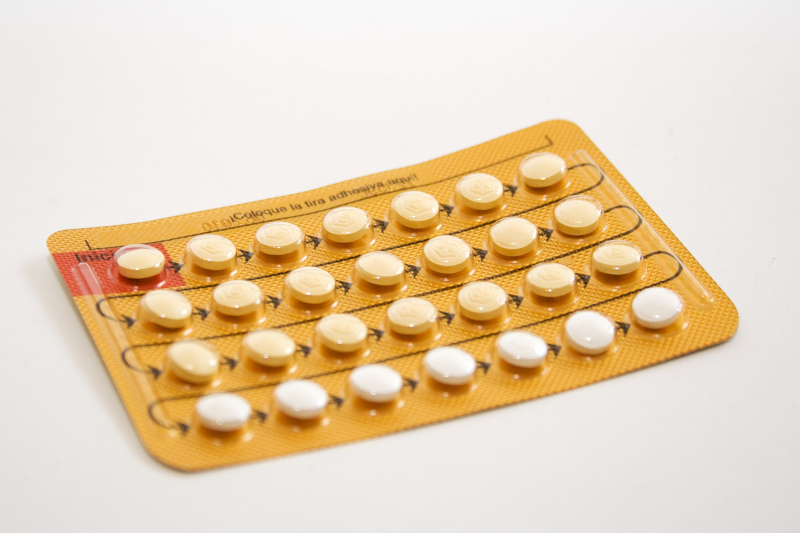 避孕药,有月经,橙色,白色背景,卵巢,水平画幅,女人,成年的,分娩,摄影