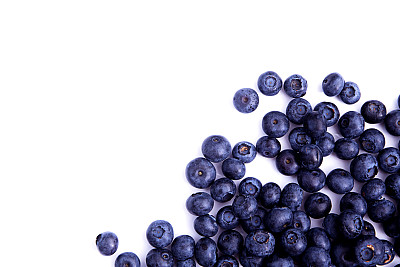 白色底板上的蓝莓高清摄影