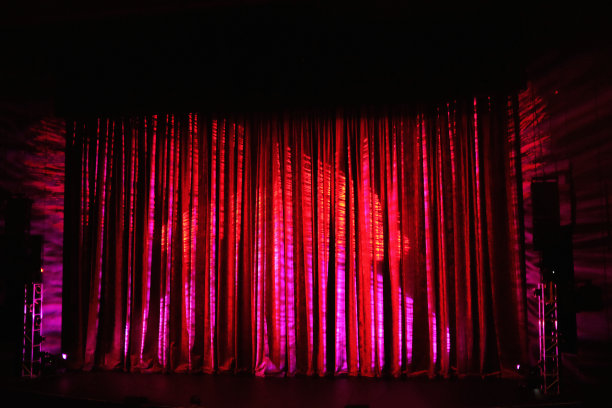 紫色舞台灯光背景图
