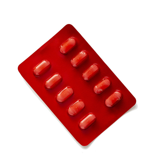 维生素药品红色药丸背景素材