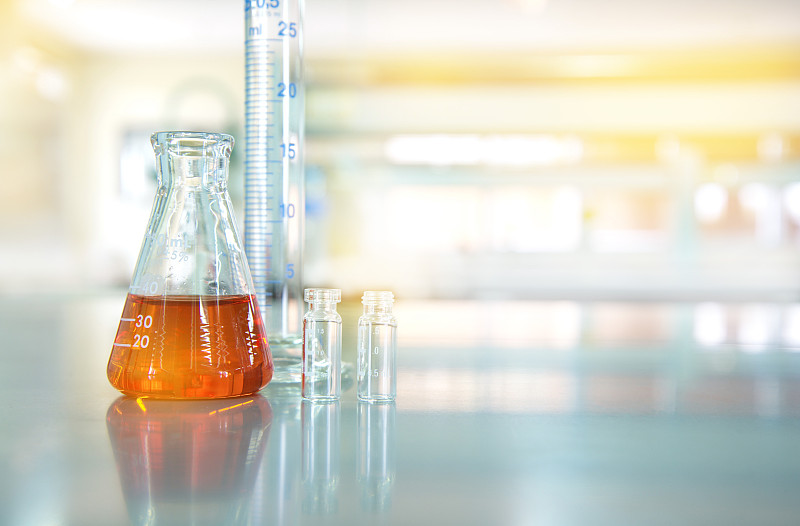 实验室,小瓶,烧瓶,圆柱体,液体,化学制品,背景,橙色,水,生物科技