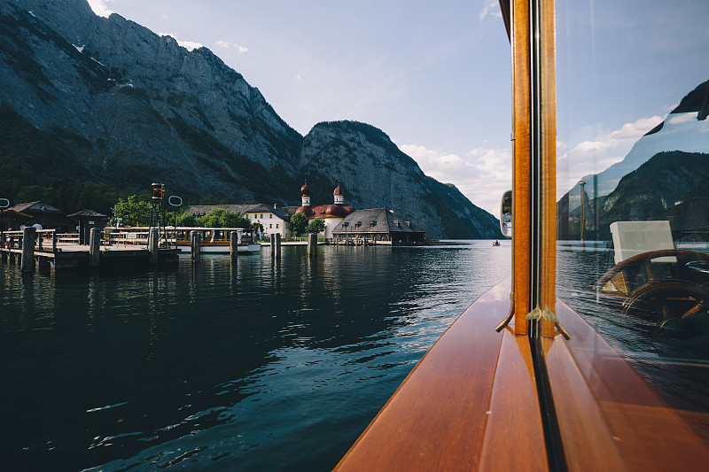 Traditional,passenger,boat,on,Konigssee,lake,with,famous,St.,Bartholom?¤,pilgrimage,chapel,in,summer,,Bavaria,,Germany