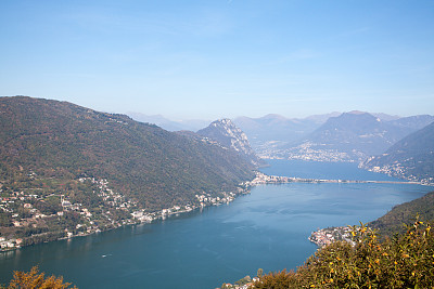 秋天的卢加诺湖和阿尔卑斯山的空中全景图