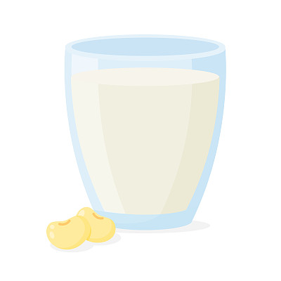 豆浆和大豆倒入一个透明的玻璃杯中，供早上饮用。卫生保健的概念
