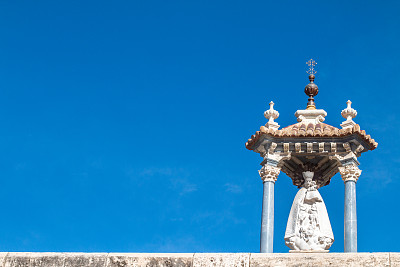 Virgin of the Forsaken Monument on Puente de la Mar (Bridge of the Sea) at Turia Riverbed Park (Jardín del Turia - Tramo VIII) in Valencia, Spain