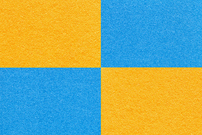 工艺质感明黄蓝纸底色带有细胞花纹，微距。