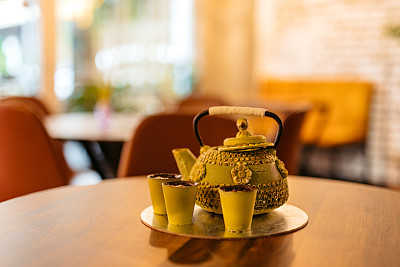 Cake In The Shape Of A Teapot On The Table At The Café