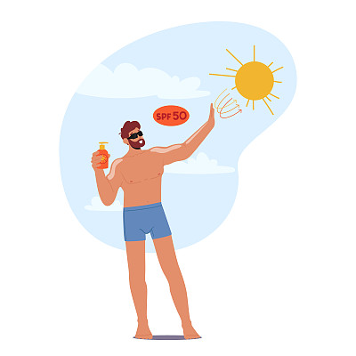 一名男子在沙滩上享受日光浴时涂抹防晒霜保护皮肤免受有害紫外线的伤害。男性确保皮肤安全