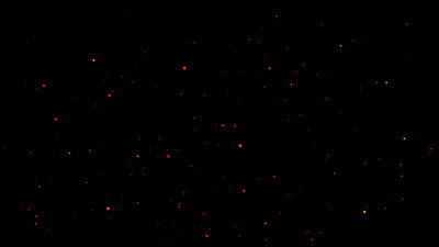 在夜空中燃烧着炽热的火花。美丽的抽象背景飞在黑色的背景。