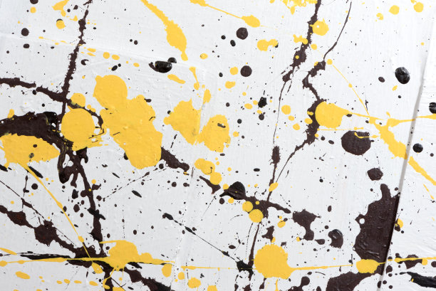 抽象画上白色、棕色和黄色的泼洒艺术背景