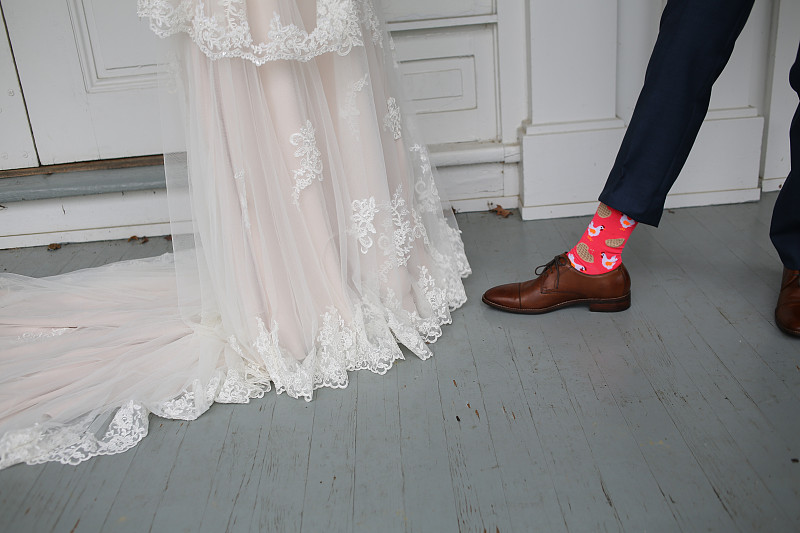 Wedding,Photography,Bride,and,Grooms,Feet,–,Blue,Wedding,Shoes,and,Brown,Men’s,Leather,Shoes,with,Silly,Neon,Pink,Chicken,and,Waffles,Socks