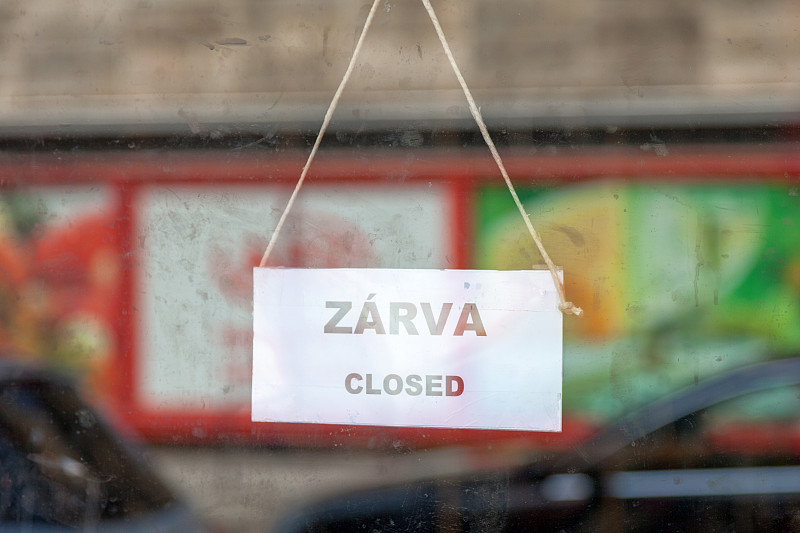 Old,fashioned,sign,in,the,window,of,a,shop,saying,in,Hungarian,"Zárva",,meaning,in,english,"Closed".