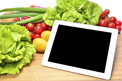 蔬菜水果和平板电脑