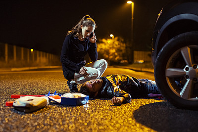 Car accident and woman on the phone