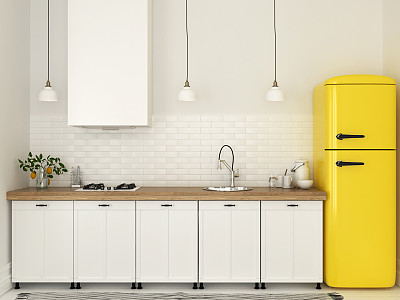 有白色家具和黄色冰箱的厨房