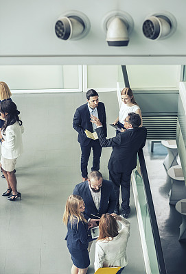 Group of business people in the office building lobby