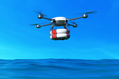 带救生圈的救援无人机在海洋上空飞行。