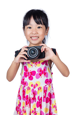 亚洲小中国女孩拿着相机