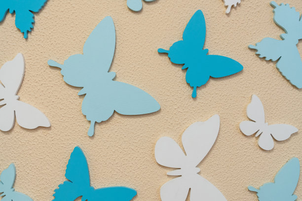 蓝白花卉蝴蝶图案素材