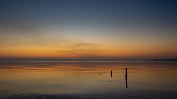 大海沙滩夕阳云彩天空高清图片