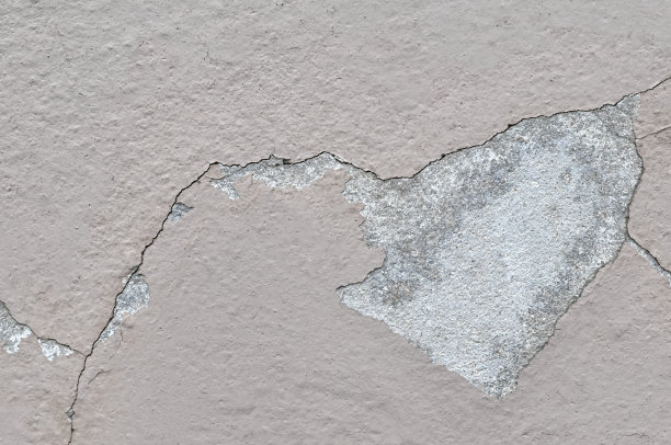 剥落的石灰墙古典墙壁