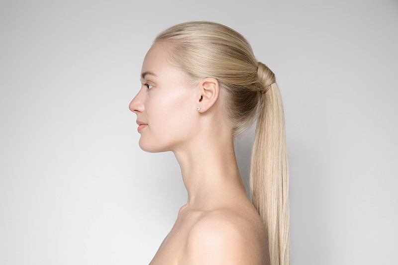 Beautiful,Young,Blond,Woman,With,Ponytail,Hairsty?le.,Side,View