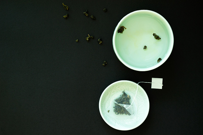 茶碟,茶话会,日式茶杯,茶叶,黑色背景,留白,芳香的,水平画幅,纺织品,无人